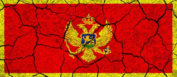 Montenegro flagga på en vit sten vägg redigeras — Stockfoto