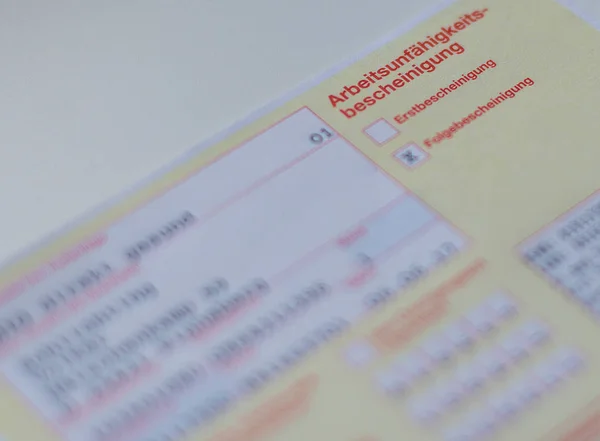 Κίτρινο άρρωστο πιστοποιητικού πιστοποιητικό μια γερμανική από — Φωτογραφία Αρχείου