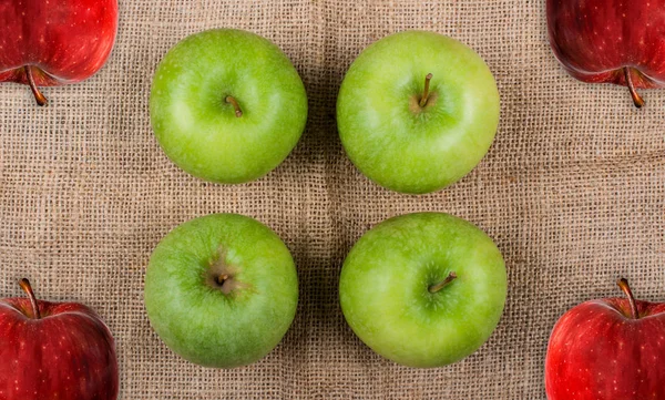 Apples photographed on a Jute fabric — Stock Photo, Image