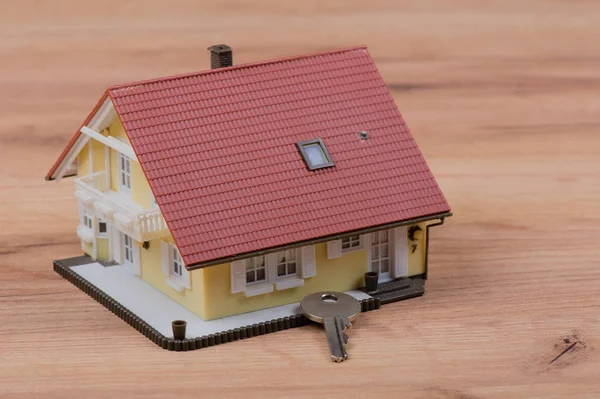 Model house with door key — Stock Photo, Image