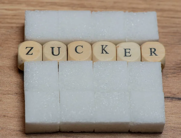 Zucker Texto Alemán Azúcar Palabra Letras Cuadritos Cúbicos Tabla — Foto de Stock