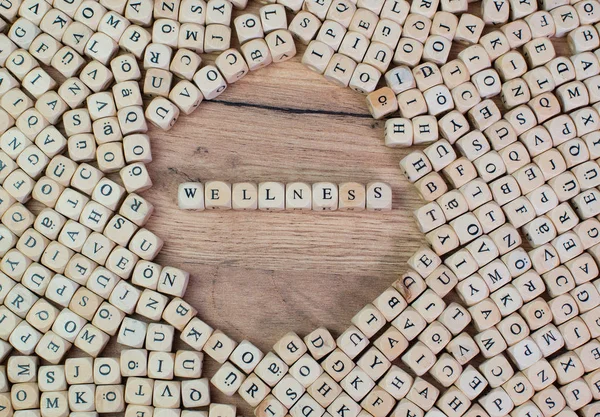 Wellness German Text Wellness Word Letters Cube Dices Table — Stock Photo, Image