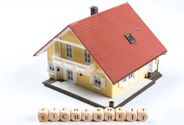 Sicherheit German Text Safety Word Letters Cube Front Model House — Stock Photo, Image