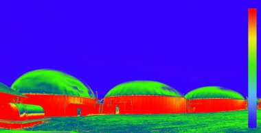 Thermal image with thermal imaging camera of a biogas plant for power generation and energy production clipart