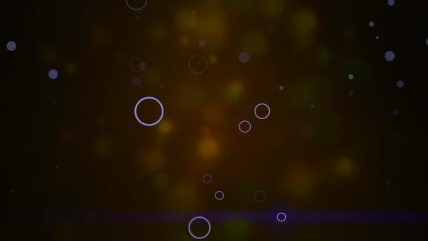 Bokeh particles float and glisten over dark background with depth of field. — Stock Video