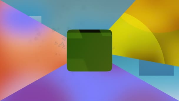 Abstract geometric shapes background with green square in the center of colorful polygonal composition. — Stock Video