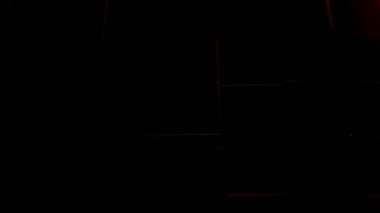 Cubes network with information inside, moving and connecting, forming a cubical wall in red gradient.