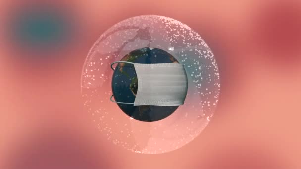 3d maken planeet in medisch masker als bescherming tegen infectie over roze wazig achtergrond. — Stockvideo