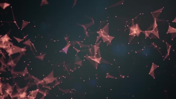 Particules roses se déplaçant chaotiquement sur un fond bleu foncé . — Video