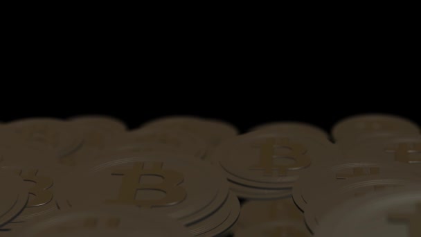 Pile of bronze bitcoins on the black background. — Stock Video