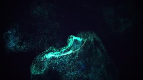 Mouvement de l'explosion de poussière bleue isolé sur fond noir.