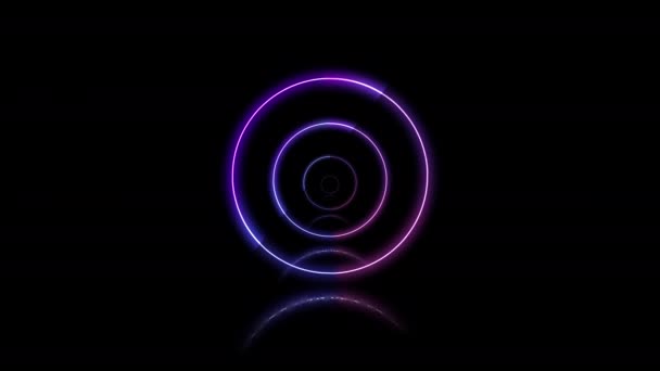 Several neon circles inside each other changing color on the black background. — Stock Video