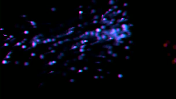 Bleu scintille dans un focus flou sur le fond noir . — Video