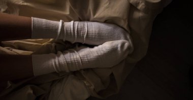 women's feet in white stockings white socks on the bed style background screensaver picture decor nostalgia romance picture for classical music