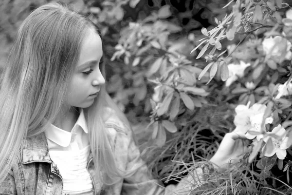 Young girl with long white hair in a denim jacket — ストック写真