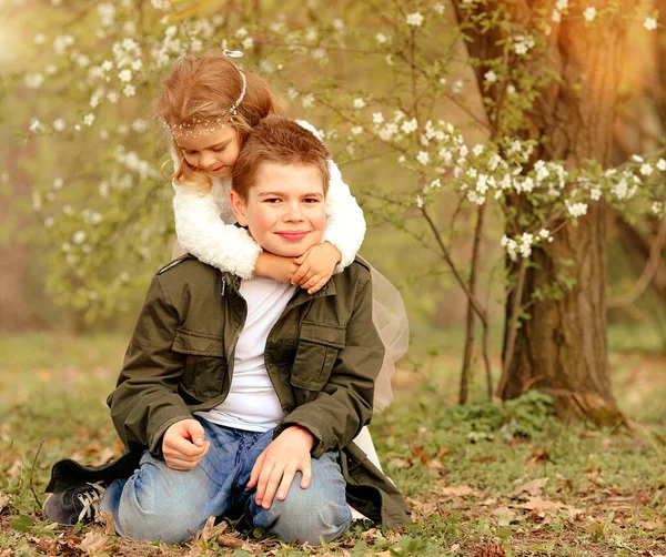Native Cheerful Elder Brother Little Sister Have Fun Spring Park Royalty Free Stock Images