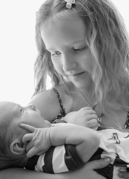 Loving Older Sister Blonde Sweetheart Touching Gentle Holds Her Newborn — Stock Photo, Image