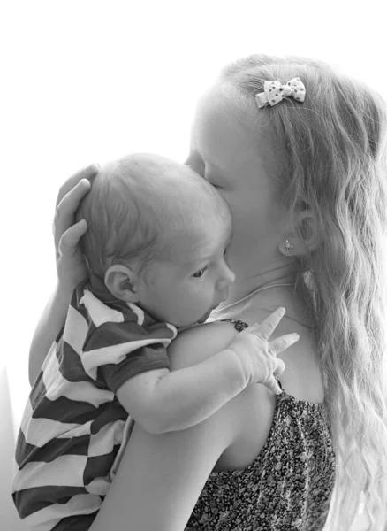 Loving Older Sister Blonde Sweetheart Touching Gentle Holds Her Newborn — Stock Photo, Image