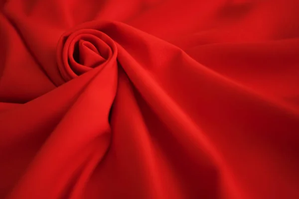 Red batiste made of cotton. sample of red soft fabric with pleats. Top view — Stock Photo, Image