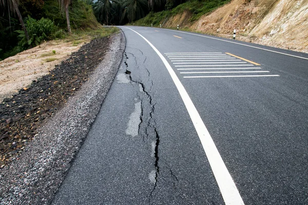 Cracked asphalt road. — Stock Photo, Image