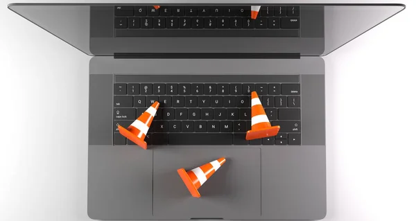 Gerçekçi trafik konileri Laptop klavye üst üzerinde 3D render — Stok fotoğraf