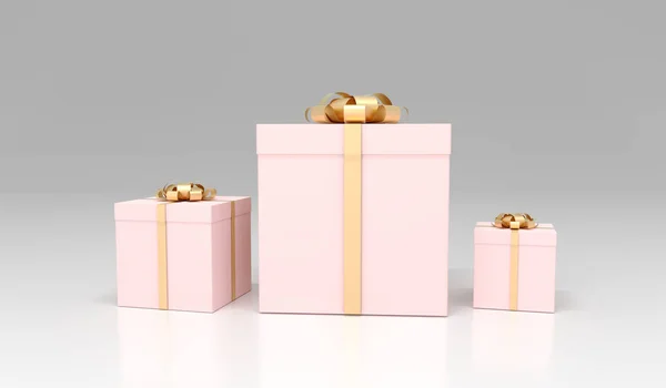 Реалістичні рожеві подарункові коробки різного розміру — стокове фото