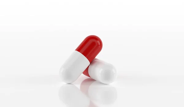 Białe i czerwone kapsułki pigułki — Zdjęcie stockowe