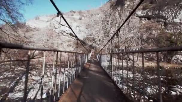 Fly Camera Rocky River Old Rusty Cable Pedestrian Bridge Unstable — Stock Video