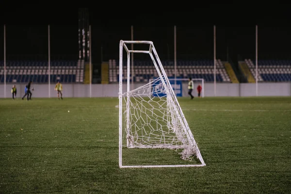 Football goal posts and net on a soccer pitch