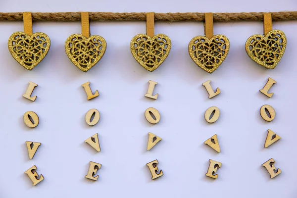 Words Love Composed Wooden Letters Wooden Hearts Pinned Twine White — Stock Photo, Image