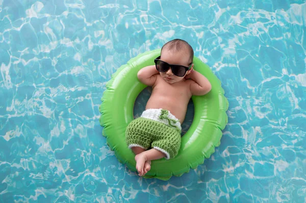 Newborn Baby Boy Floating on a Swim Ring — Stock Photo, Image