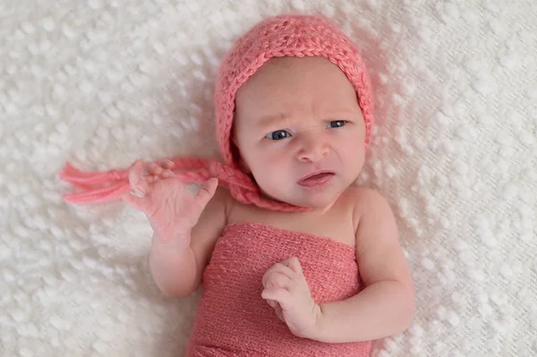 Newborn Baby Girl with Funny Expression — Stock Photo, Image