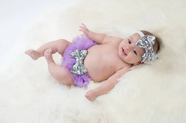 Baby Girl Wearing Purple Bloomers Stock Picture