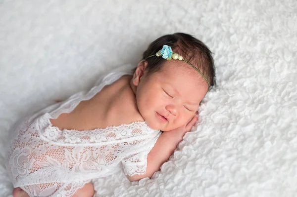 Newborn Baby Girl Wearing a White Lace Romper — Stock Photo, Image