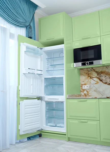 refrigerator in the kitchen