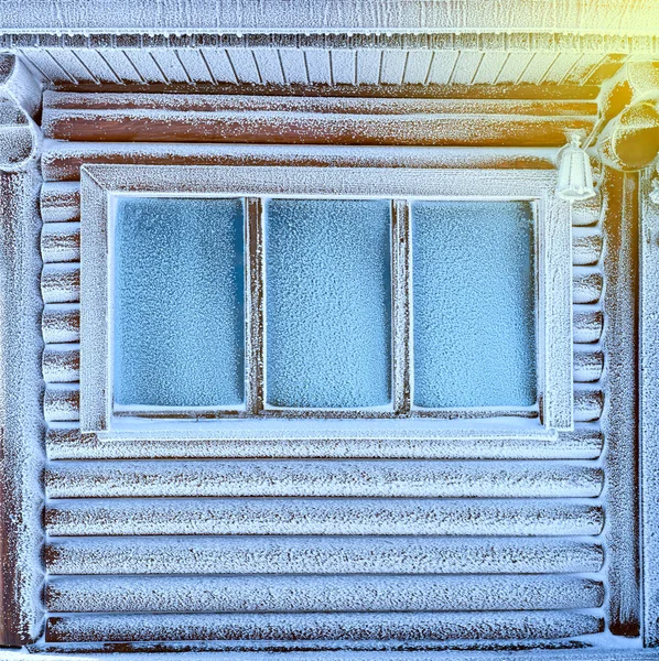 Winter window, drops of water and snowflakes on a window pane. — Stock Photo, Image