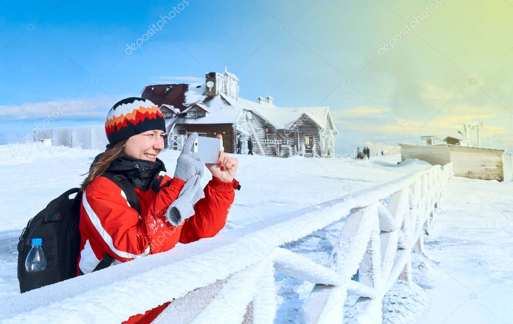 young woman photographed mountain in winter