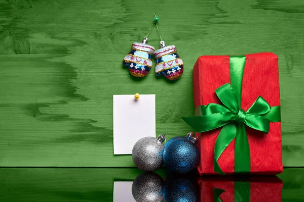 Christmas box with a gift and a sticker — Stock Photo, Image