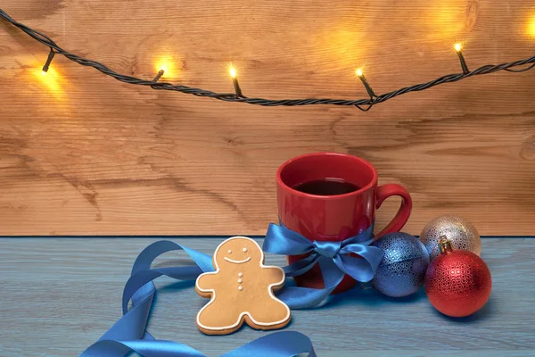 Christmas composition with a cup of coffee on the wooden table — Stock Photo, Image