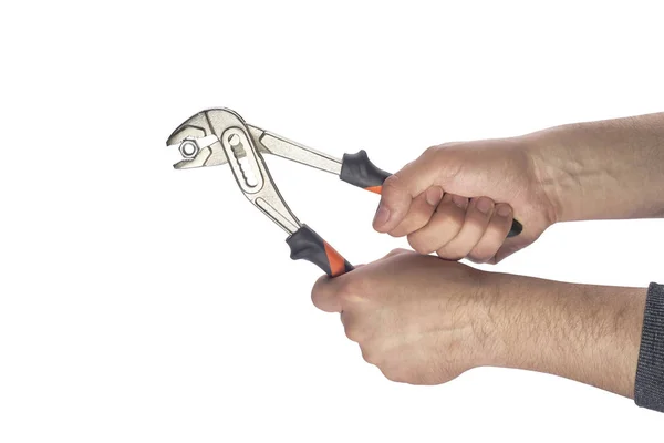 Male hands holding construction tools — Stock Photo, Image