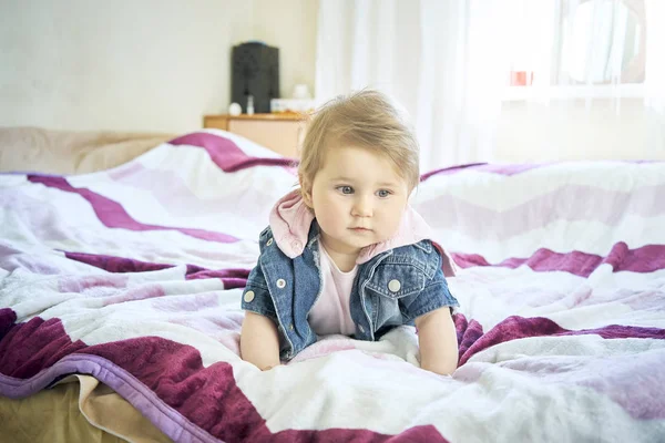 Happy baby lying on his stomach — Stock Photo, Image