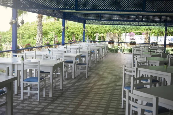 Empty tables of the restaurant in the open air — Stock Photo, Image