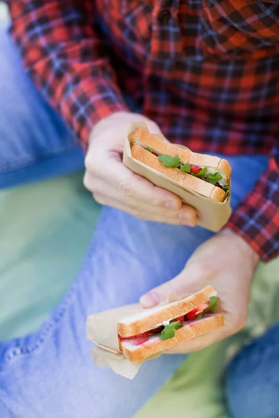 Man Holds Sandwiches Strawberry Arugula Outdoor — Stock Photo, Image