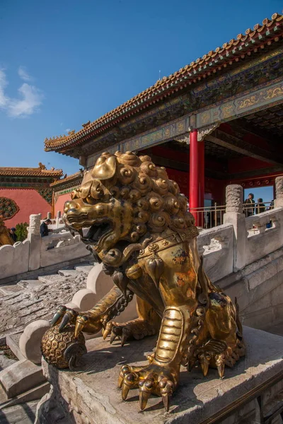 Beijing Palace Museum unloading garden in front of a pair of copper lions