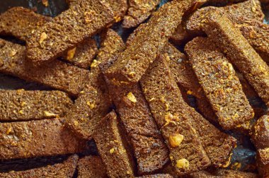 snack of bread toast with garlic, brown rye crouton