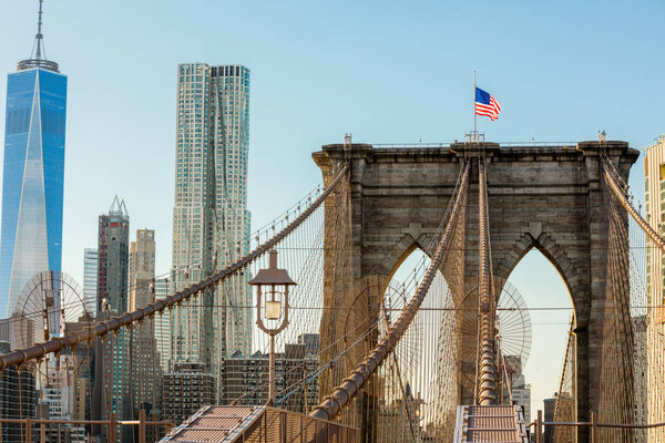 New York City Brooklyn Bridge in Manhattan, skyscrapers and city skyline over Hudson River