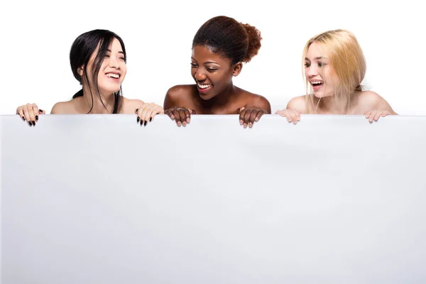 Diversity ethnicity women over an empty panel — Stock Photo, Image