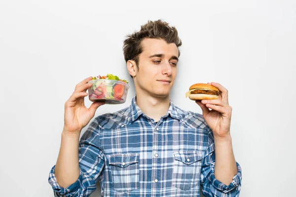 Fast food versus salad concept — Stock Photo, Image