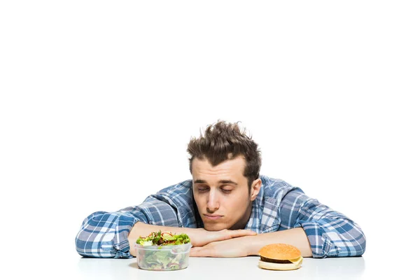 Fast food versus salat-konseptet – stockfoto