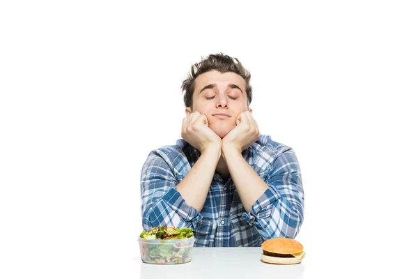 Fast food versus salad concept — Stock Photo, Image